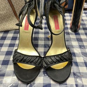 Used Betsey Johnson veto Cupid size 10, black back lace and detail on toe strap.